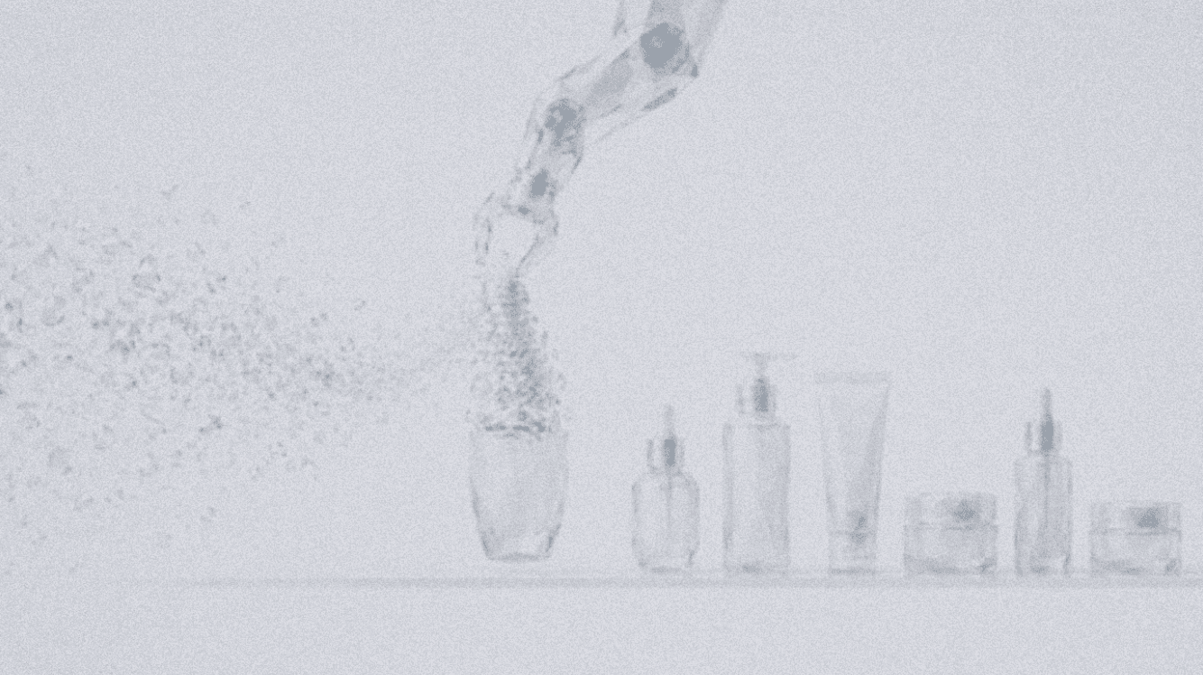 A crystalline robotic arm assembling a bottle from fractured shards beside a row of finished consumer products
